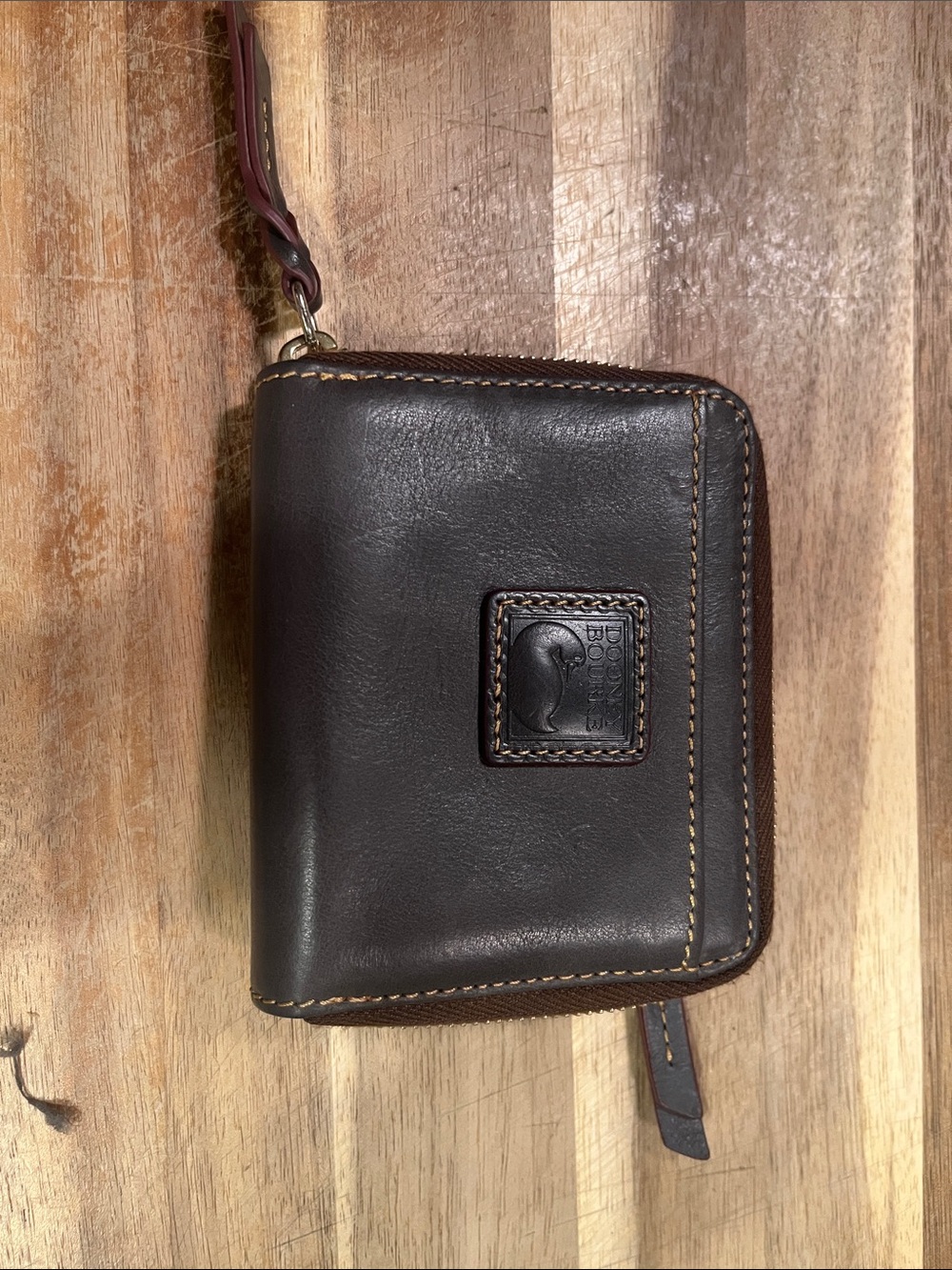 Dooney & Bourke Dark Brown Leather Zip Wallet with Wrist Strap